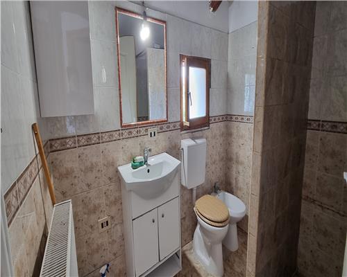 Apartament +garsoniera + teren de  180 mp la vila